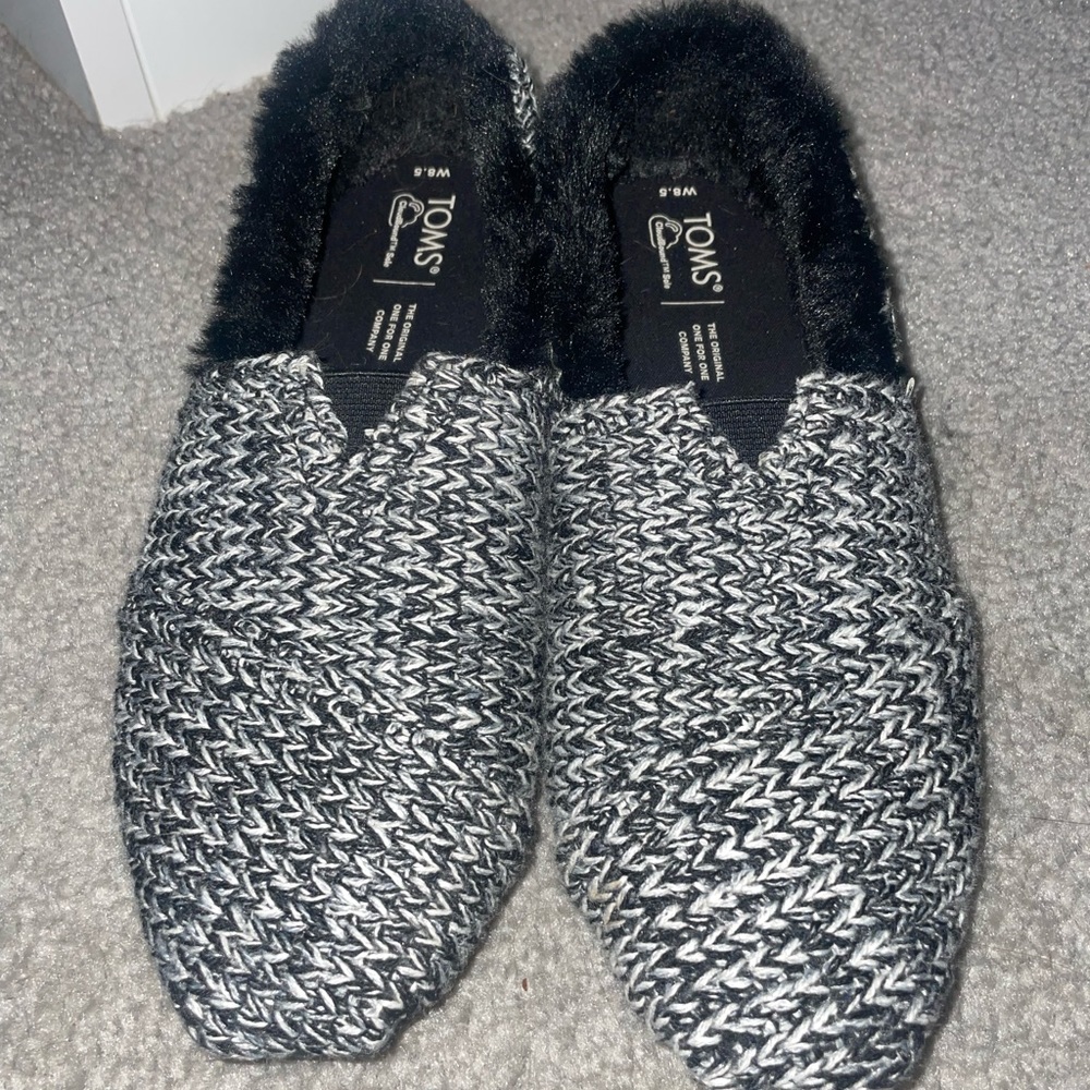 Tom’s fuzzy slip ons